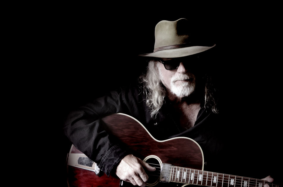 Older Man Playing Acoustic Guitar